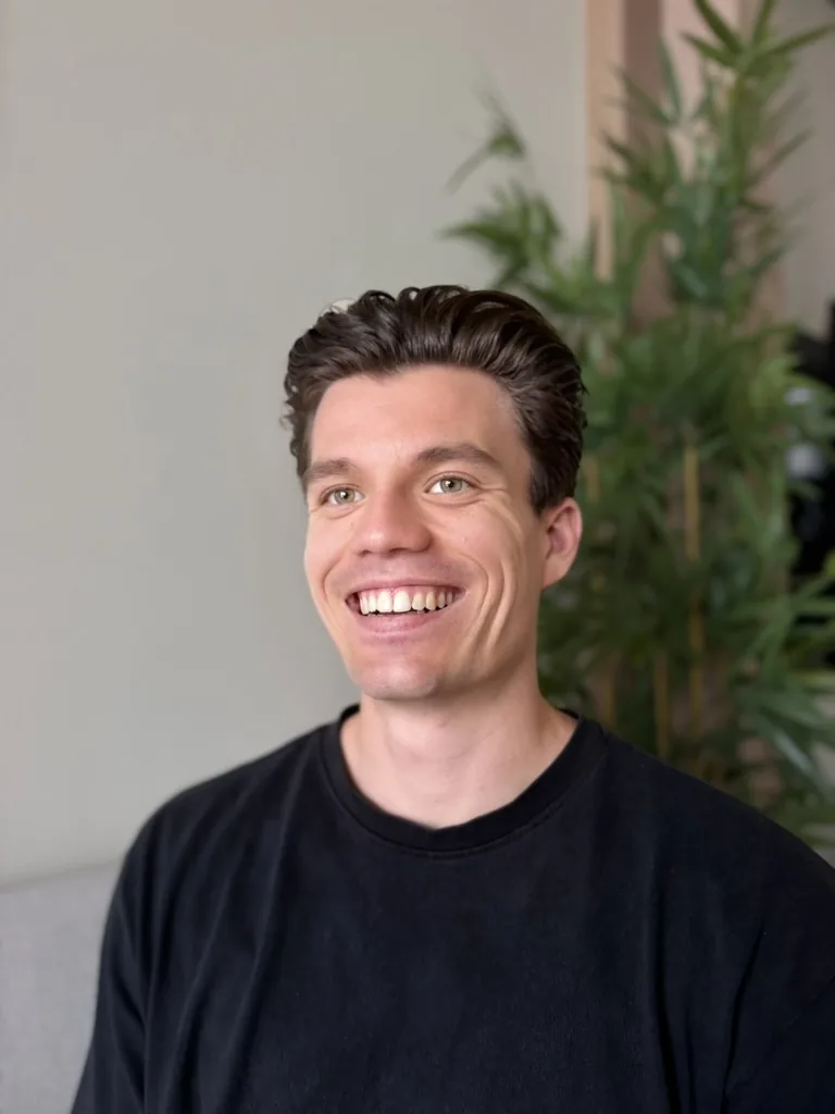 Noah Schmitz, smiling